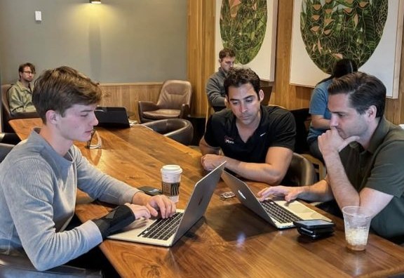 The Full Wave team working with a client